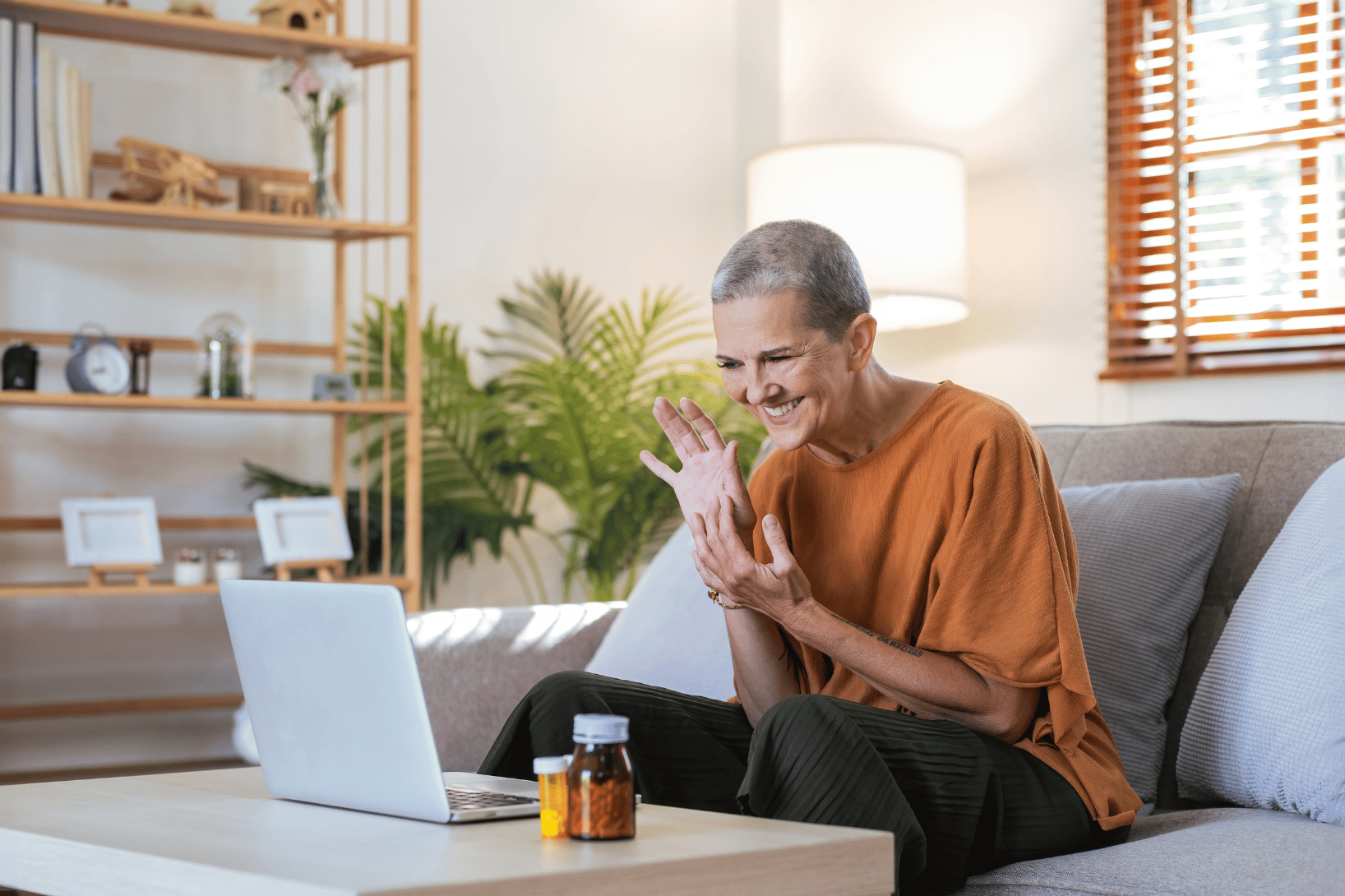 woman doing a televisit on laptop for clinical trial